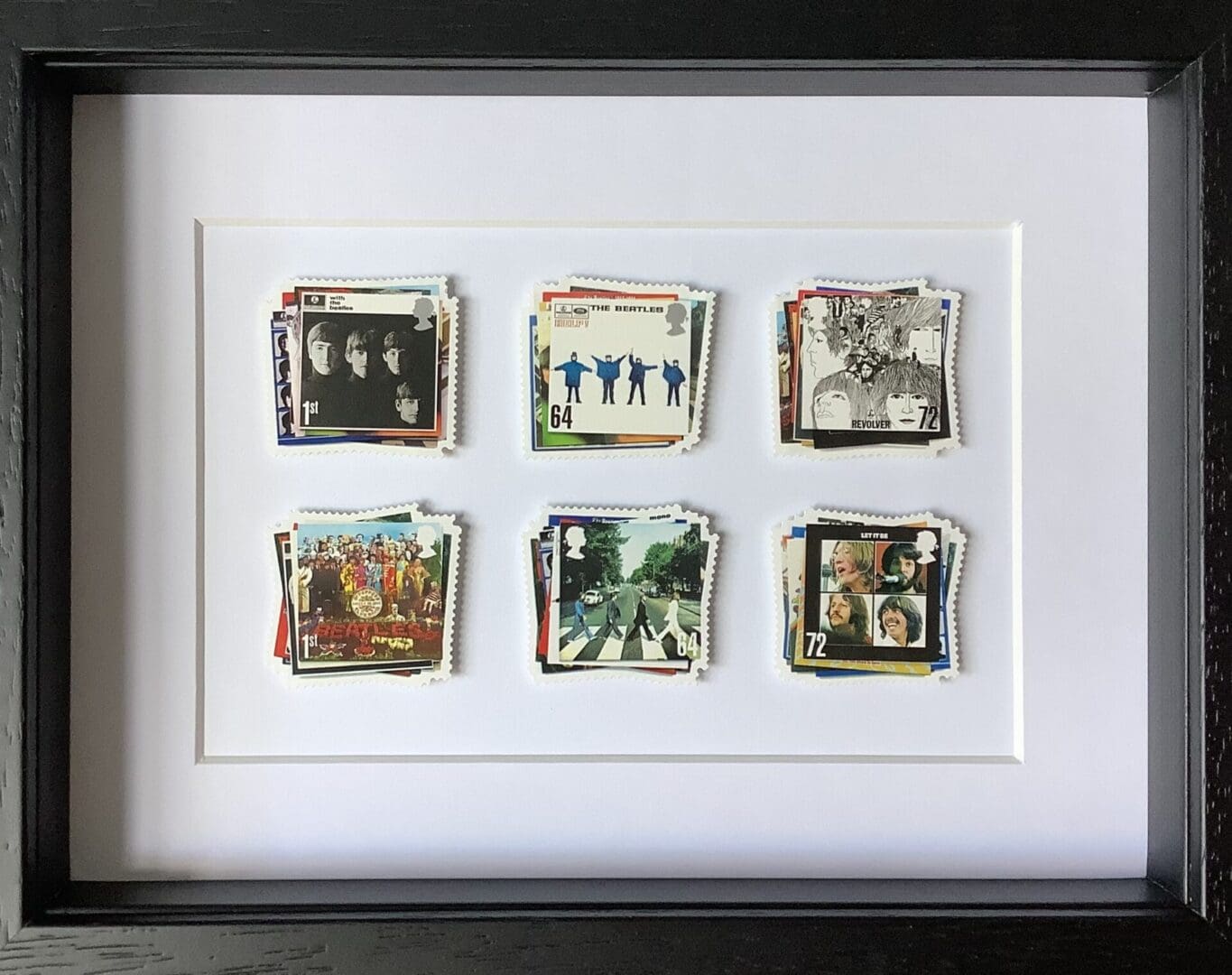 The Beatles framed postage stamps