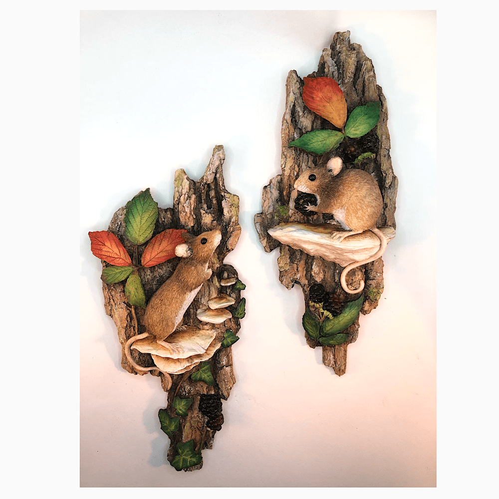 A pair of wood mouse wall sculptures in hand painted resin. Wilfred and Winifred have been created by Sculptor, Kirsty Armstrong.