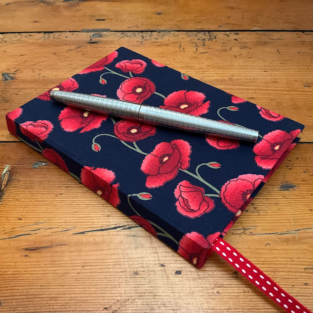 Fabric covered Poppy print A6 handmade notebook filled with plain paper