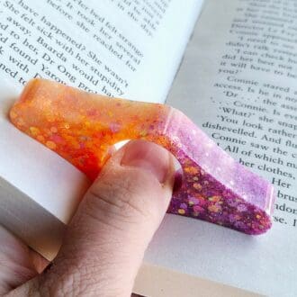 Resin page holder - thumb holder orange purple