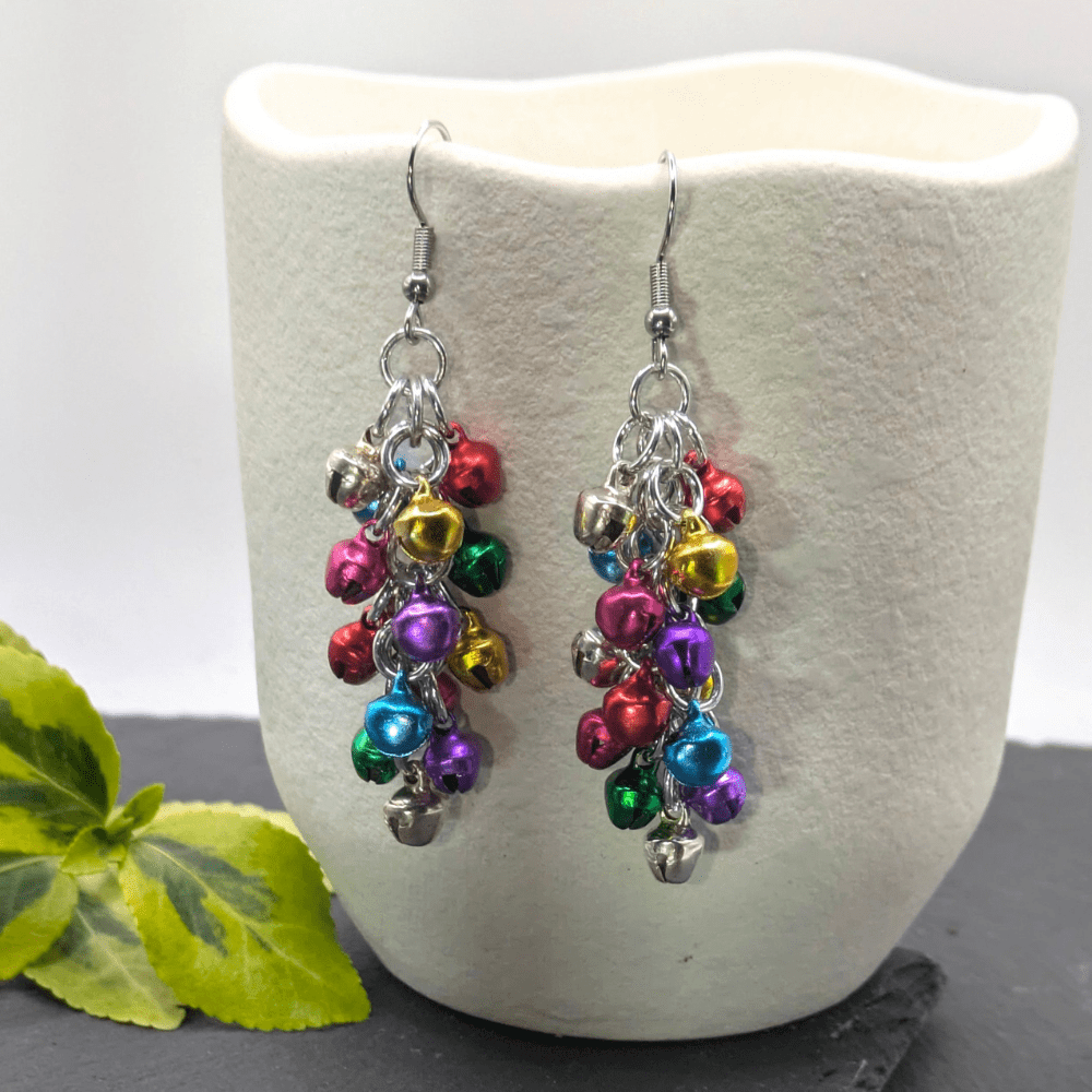 Shaggy loops chainmaille earrings made with lots of tiny bells in festive colours added to individual rings