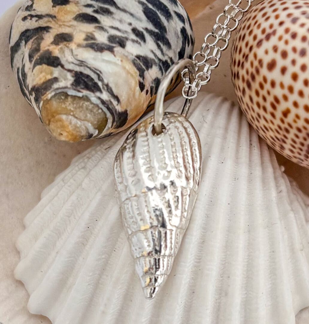 Silver shell pendant