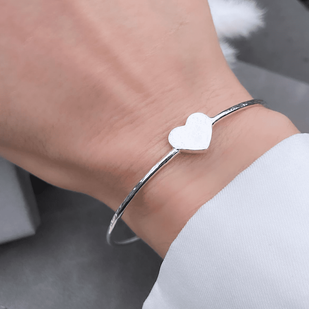 Sterling silver hammered heart bangle