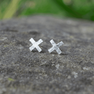 silver cross stud earrings with hammered texture