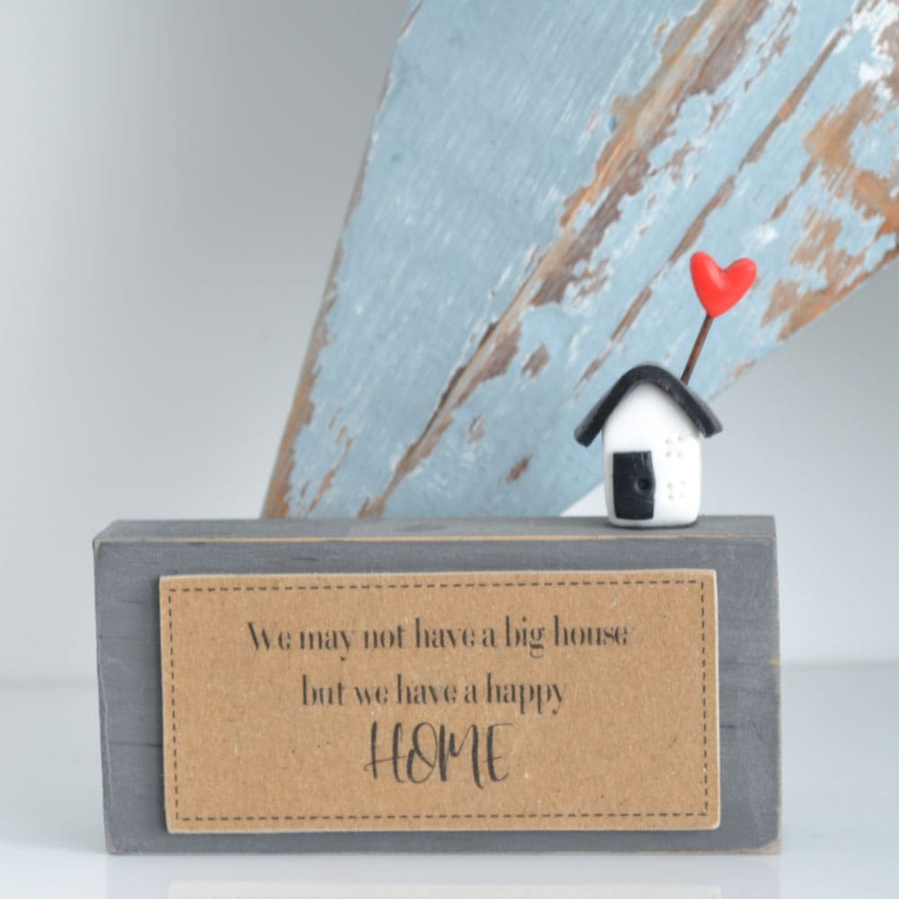 Handmade grey freestanding sign with miniature house and heart