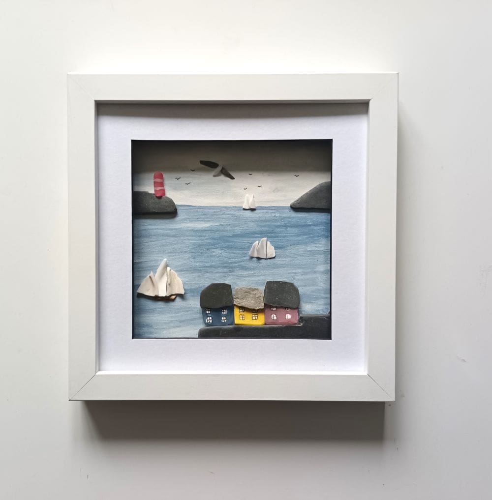 framed picture of a Cornish coastal scene made with beachcombed finds