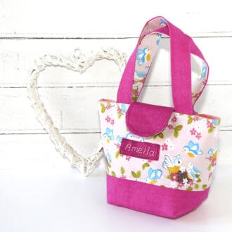 Childs toy bag personalised and showing baby birds in fabric