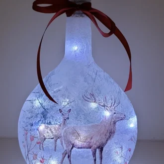 Lit up Round bottle with Stag detailing and decorative red ribbon