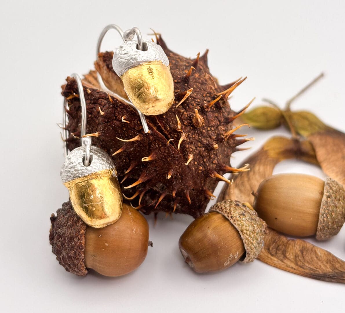 Fine silver acorn earrings with 24k gold accents