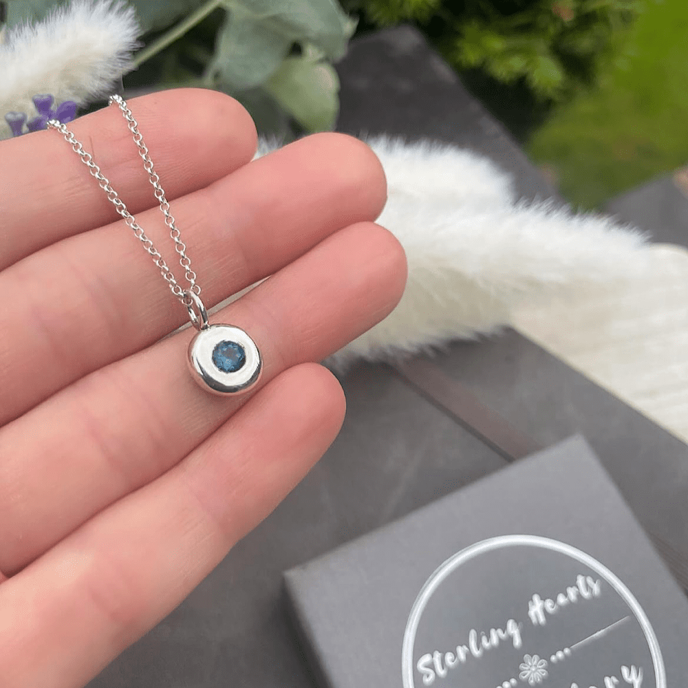 sterling silver and london blue topaz pebble necklace