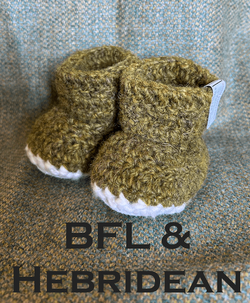 Pair of naturally dyed (using bog myrtle) green baby booties crocheted with a sheepskin sole in Hebridean wool by Midge Porter Design