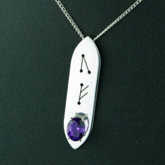 Sterling silver rune design pendant with oval amethyst by Jewellery by Linda