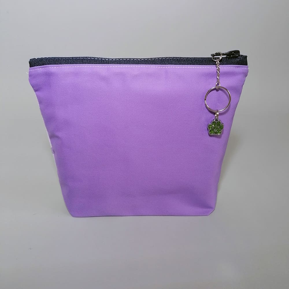 Purple reverse of dog-in-bandana make up bag