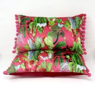 Cerise boudoir cushion with pom pom trim