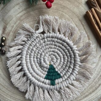 Handmade macrame coaster made with recycled cotton, with a Christmas tree design