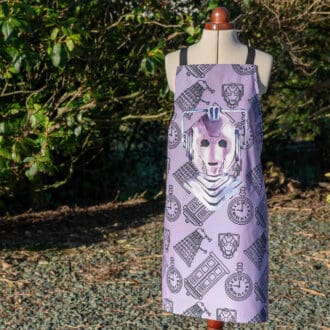 Cyberman inspired adult cotton apron on lilac in the garden