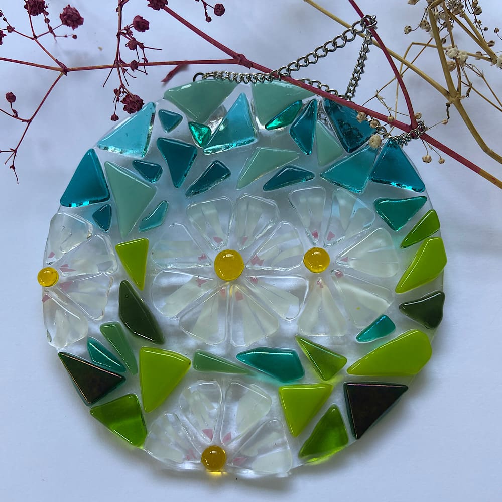 Glass daisy sun catcher.