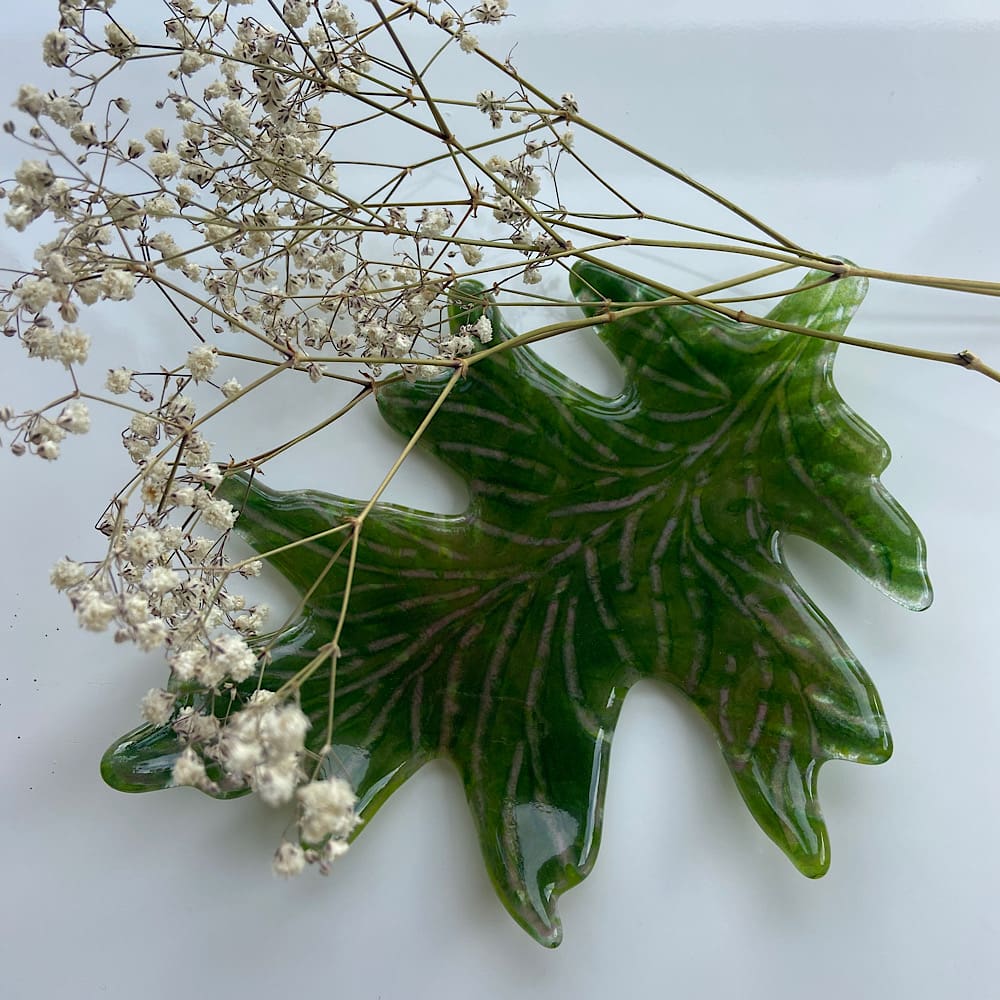 Fused glass decorative green leaf.