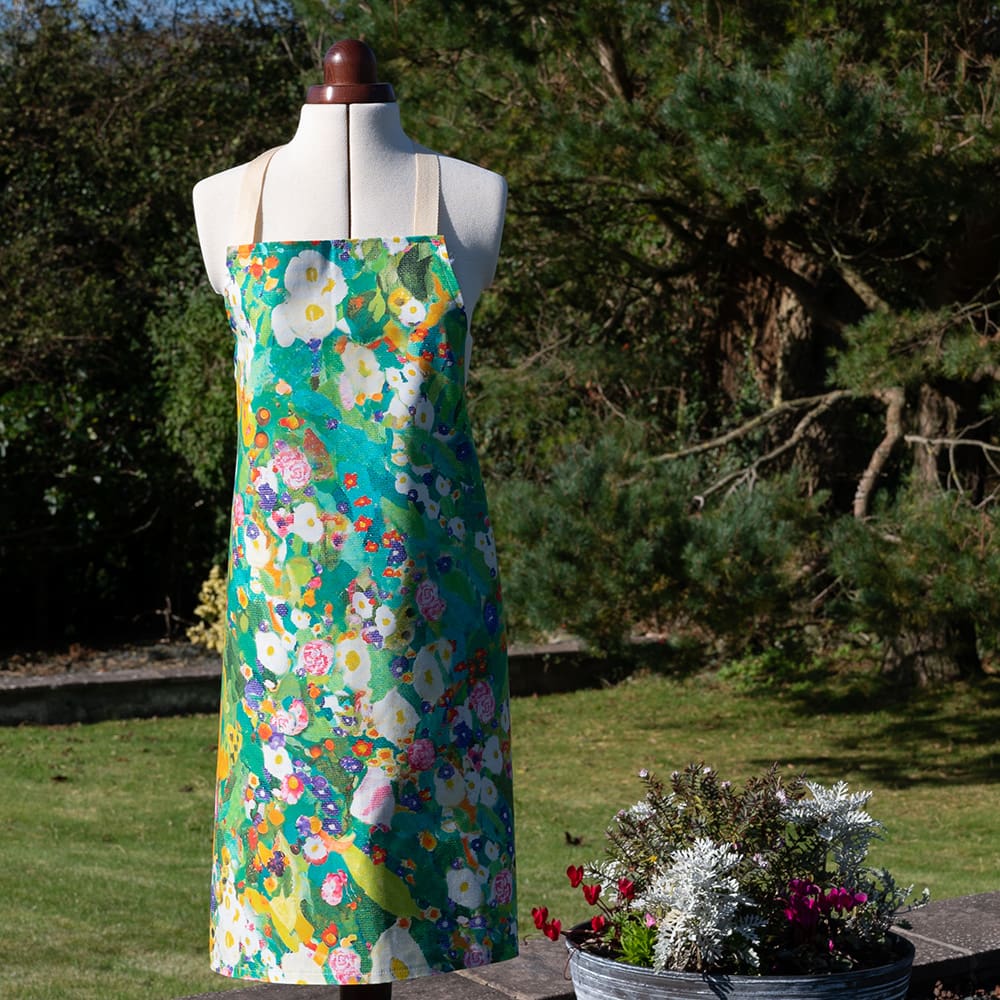 Designer cotton apron floral on display