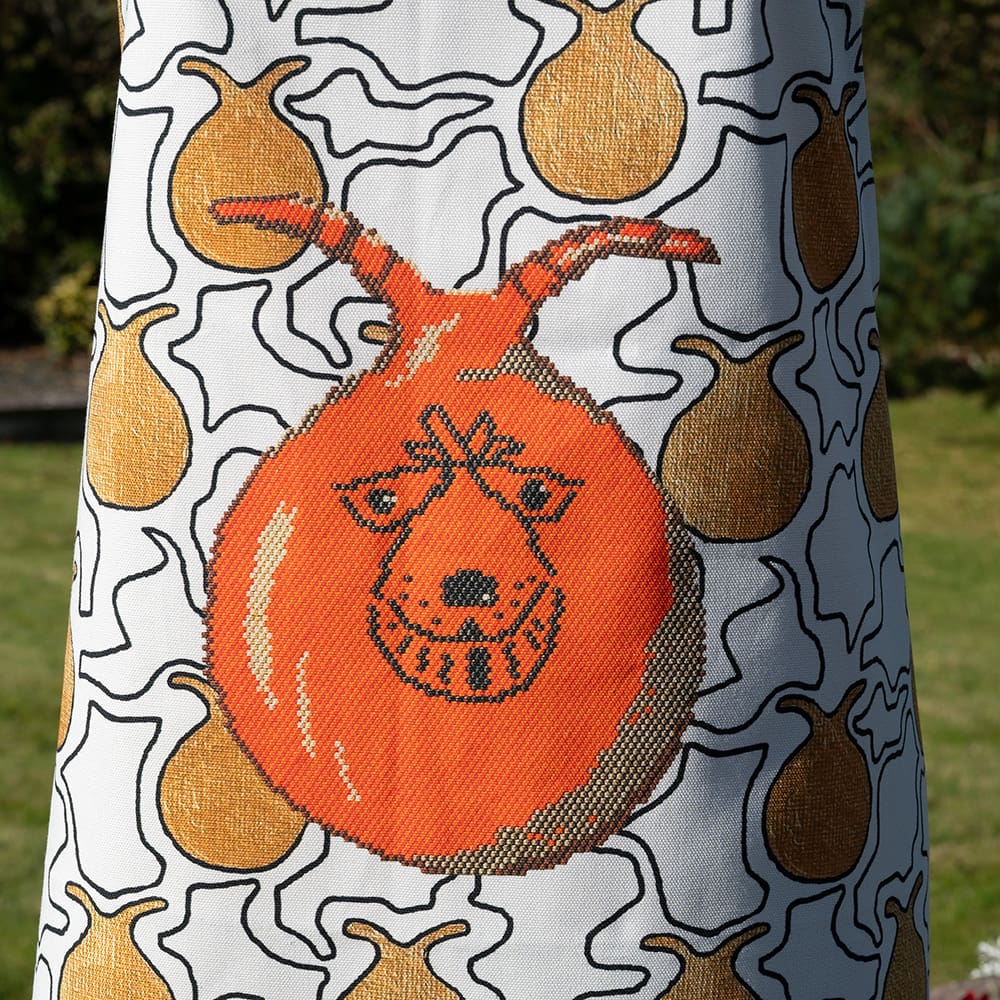 Designer cotton apron space hopper close up