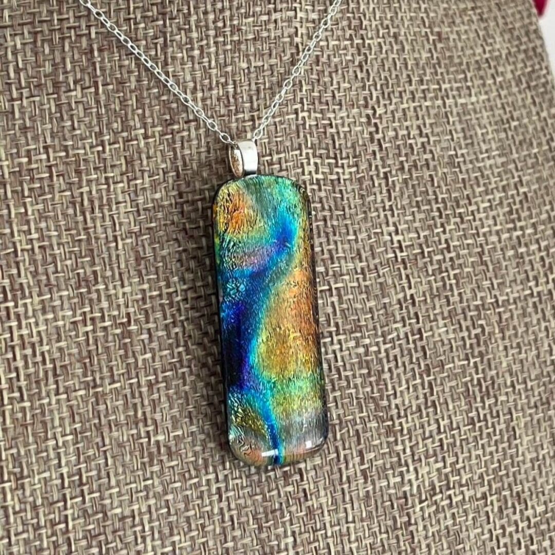 Multicoloured bright rainbow pendant dichroic fused glass