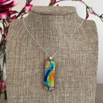 Multicoloured bright rainbow pendant dichroic fused glass