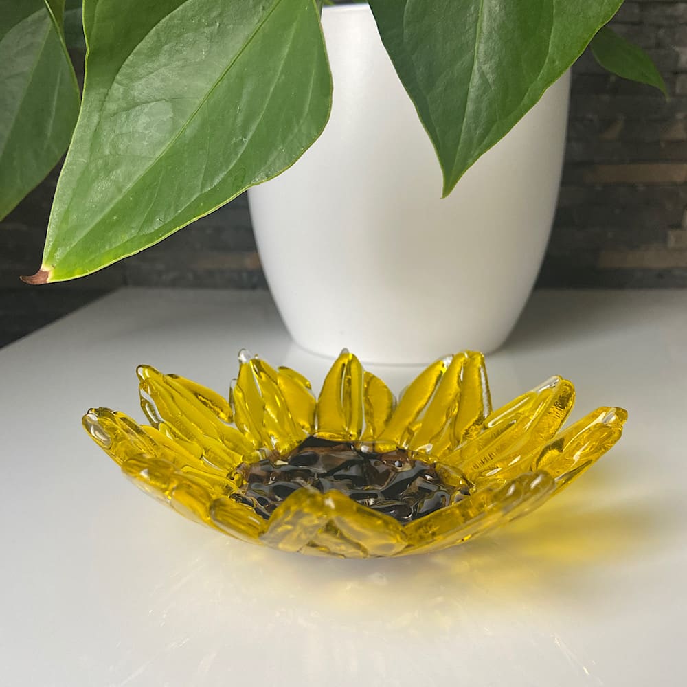 A beautiful crafted sunflower dish.