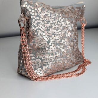 Gold sequin party bag with rose gold metal chain