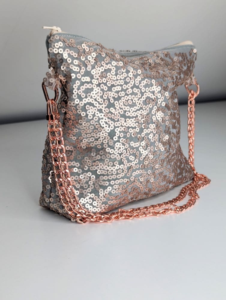 Gold sequin party bag with rose gold metal chain