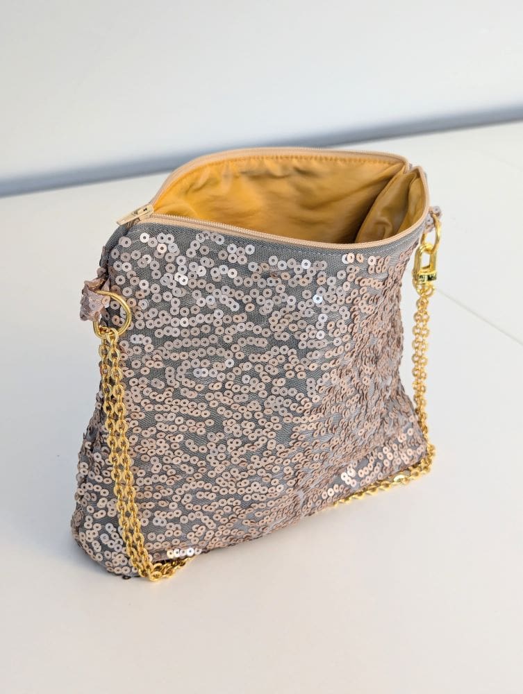 Holiday evening bag in gold sequins and a yellow lining