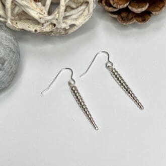 Handmade silver drop earrings with beaded texture effect, modern minimalist earrings