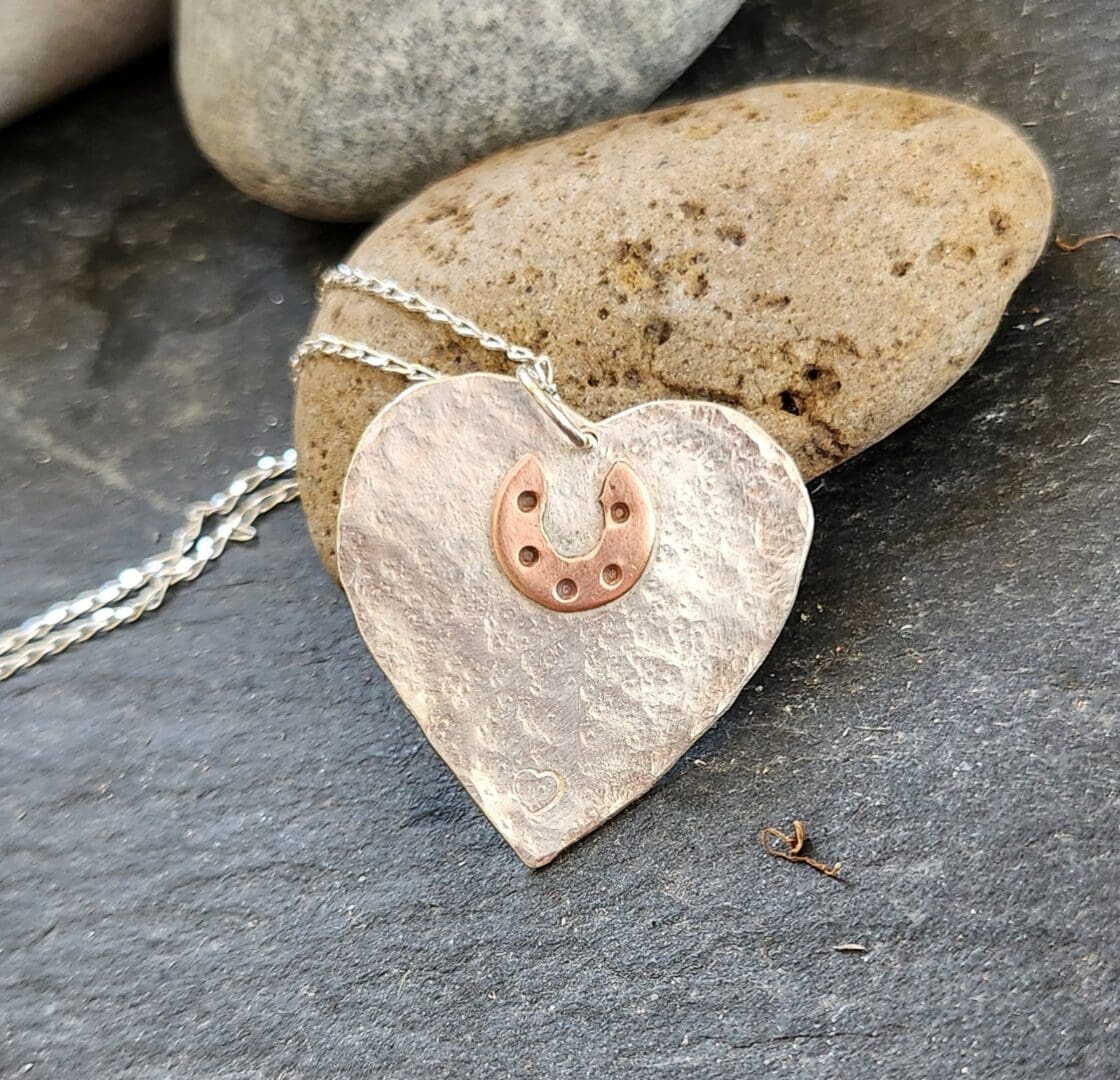 horsehoe heart pendant