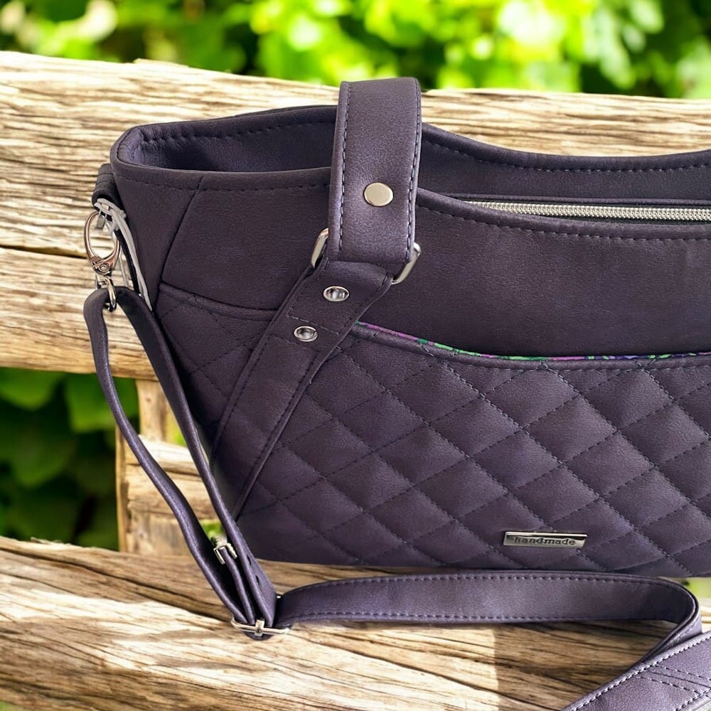 side end view of grape colour handbag for ladies