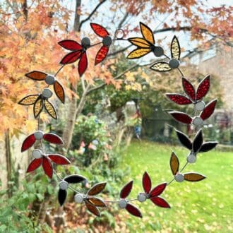 Stained glass wreath in autumnal colours