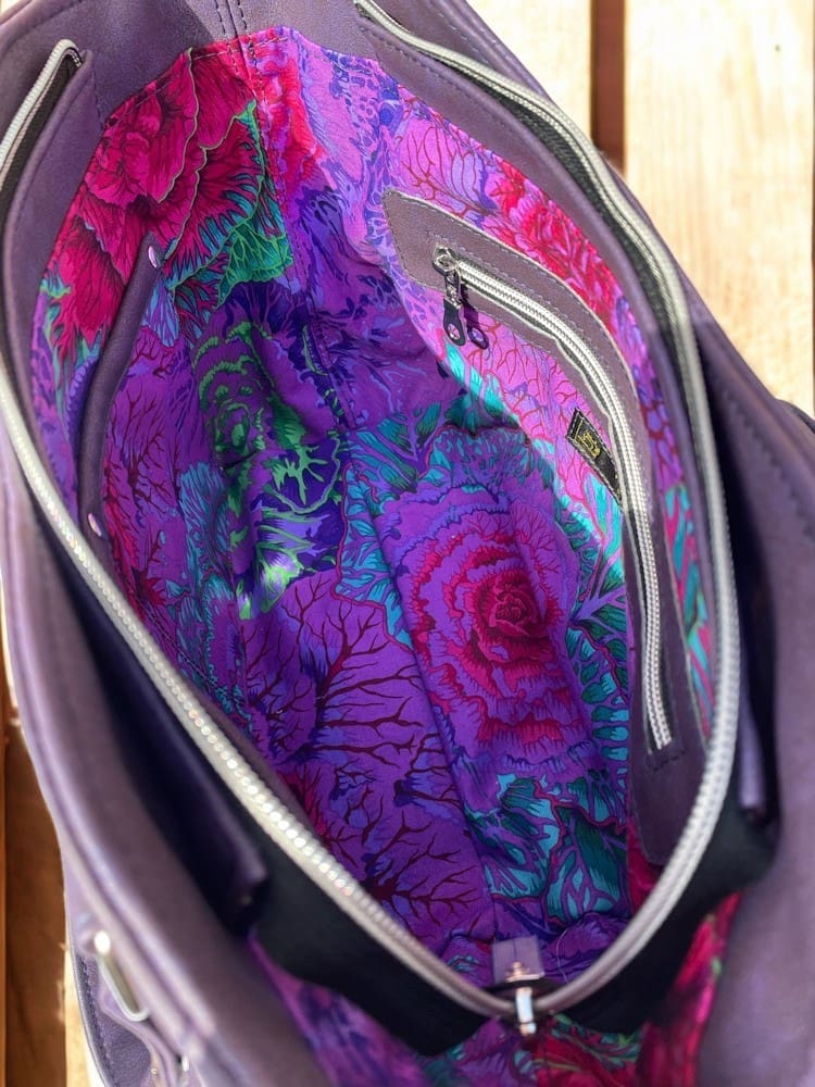 Interior view of stunning ladies handbag showing zip and slip pockets