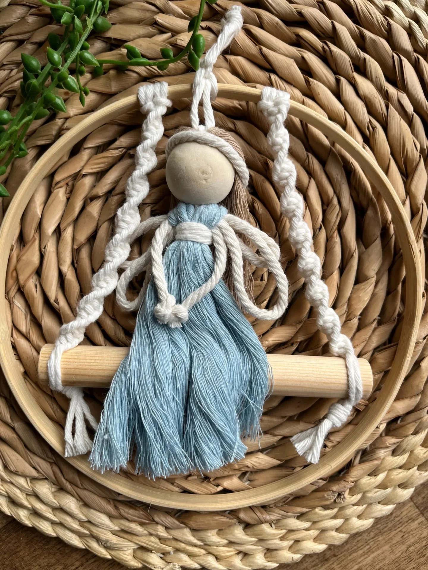 Macrame fairy on a swing hanging decoration made with recycled cotton