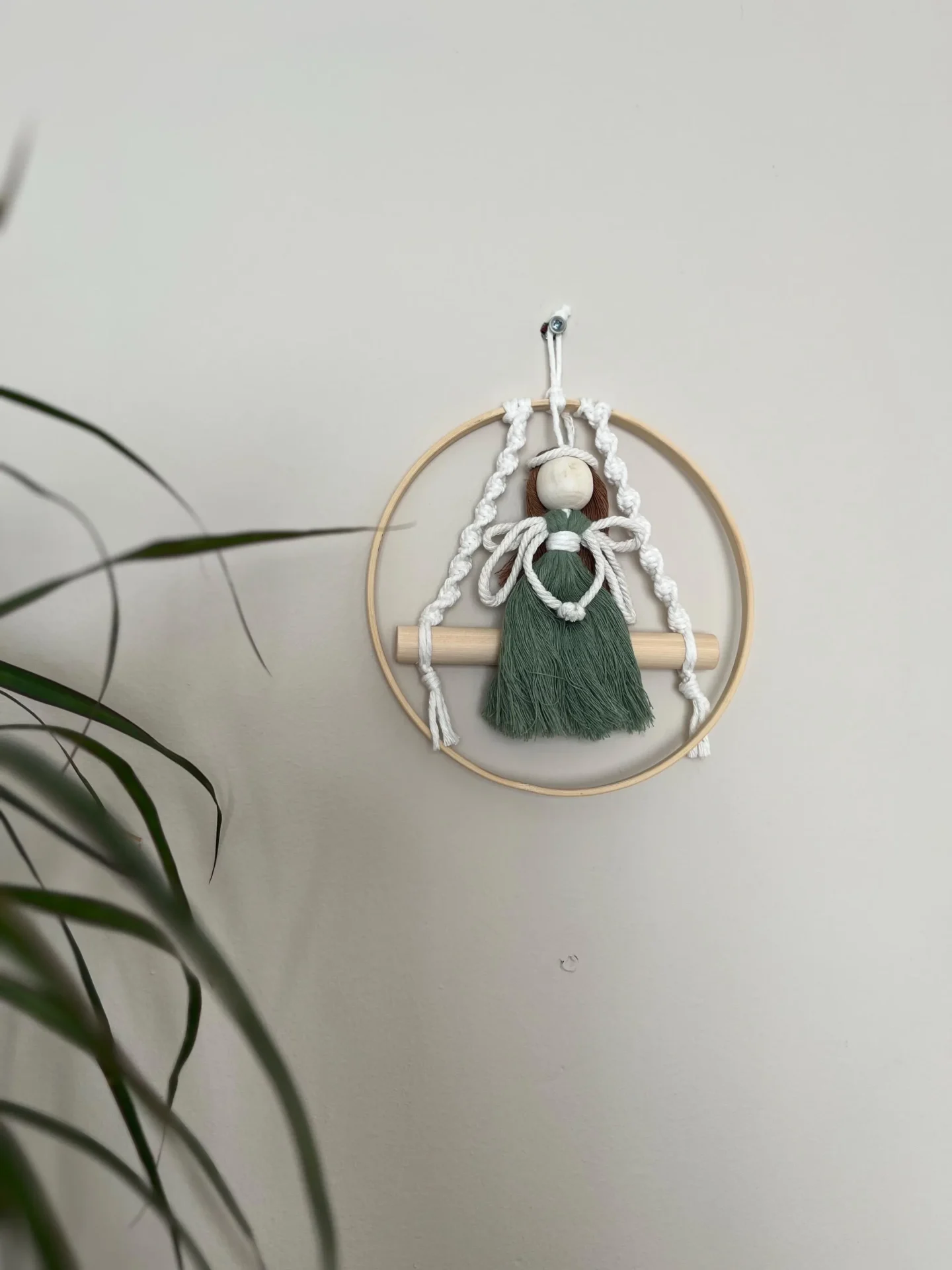 Macrame fairy on a swing hanging decoration made with recycled cotton