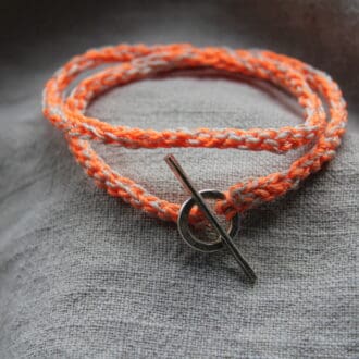 neon orange and light grey crochet bracelet with sterling silver toggle and t bar finding