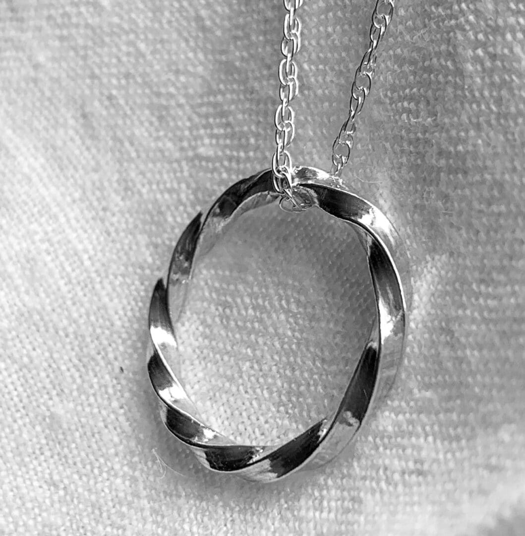 Sterling silver twisted hoop pendant