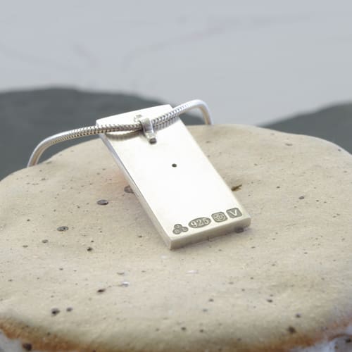 Sterling silver and black spinel handmade OOAK Mondrian inspired pendant showing hallmark detail