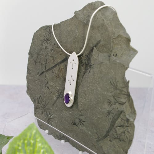 Sterling silver and oval step cut amethyst rune design pendant by Jewellery by Linda