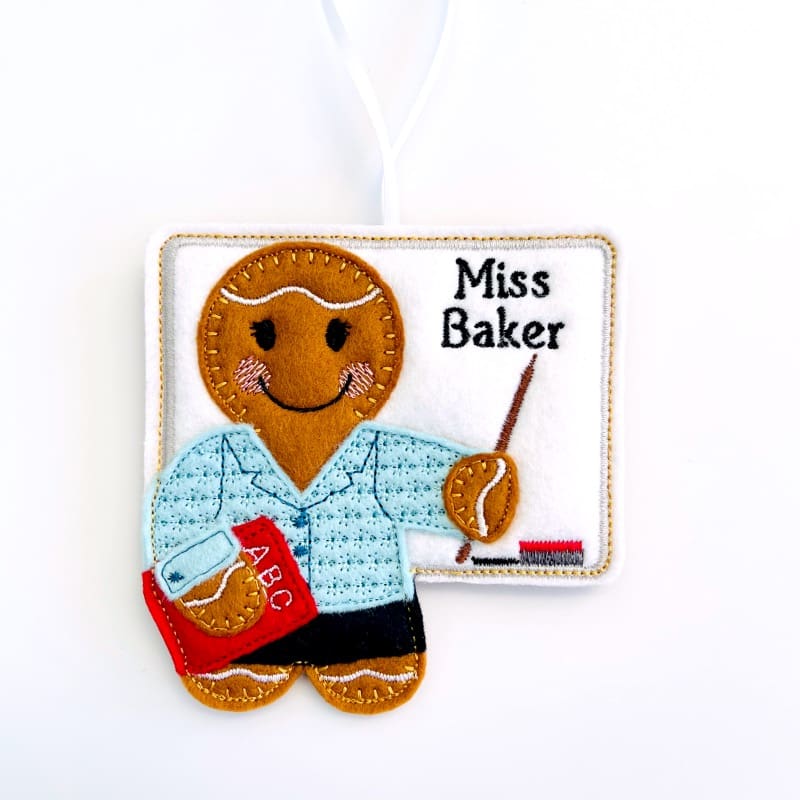 Teacher Gingerbread At Whiteboard Blue Jacket Miss Baker