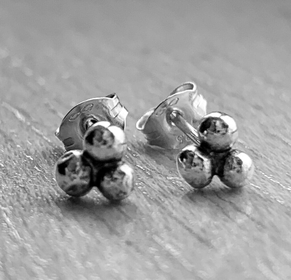 Sterling silver tri-pebble studs