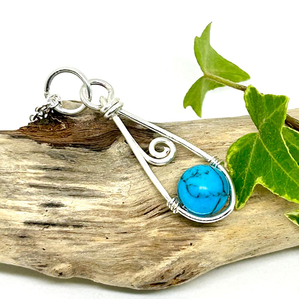 Turquoise pendant silver filled