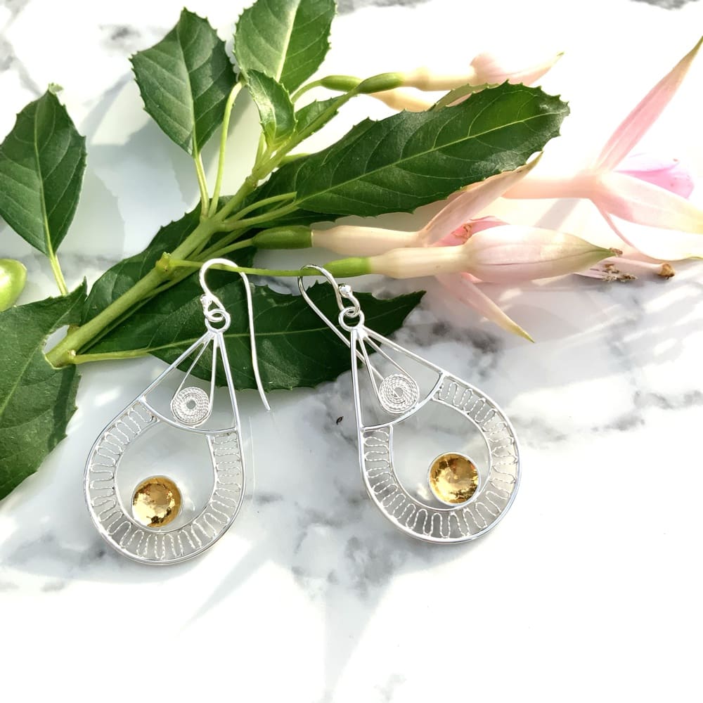 Unusual earrings in silver and gold as Christmas gift