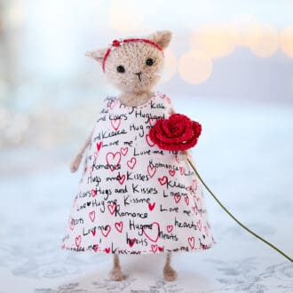 Valentines Day dressed cat doll with red rose