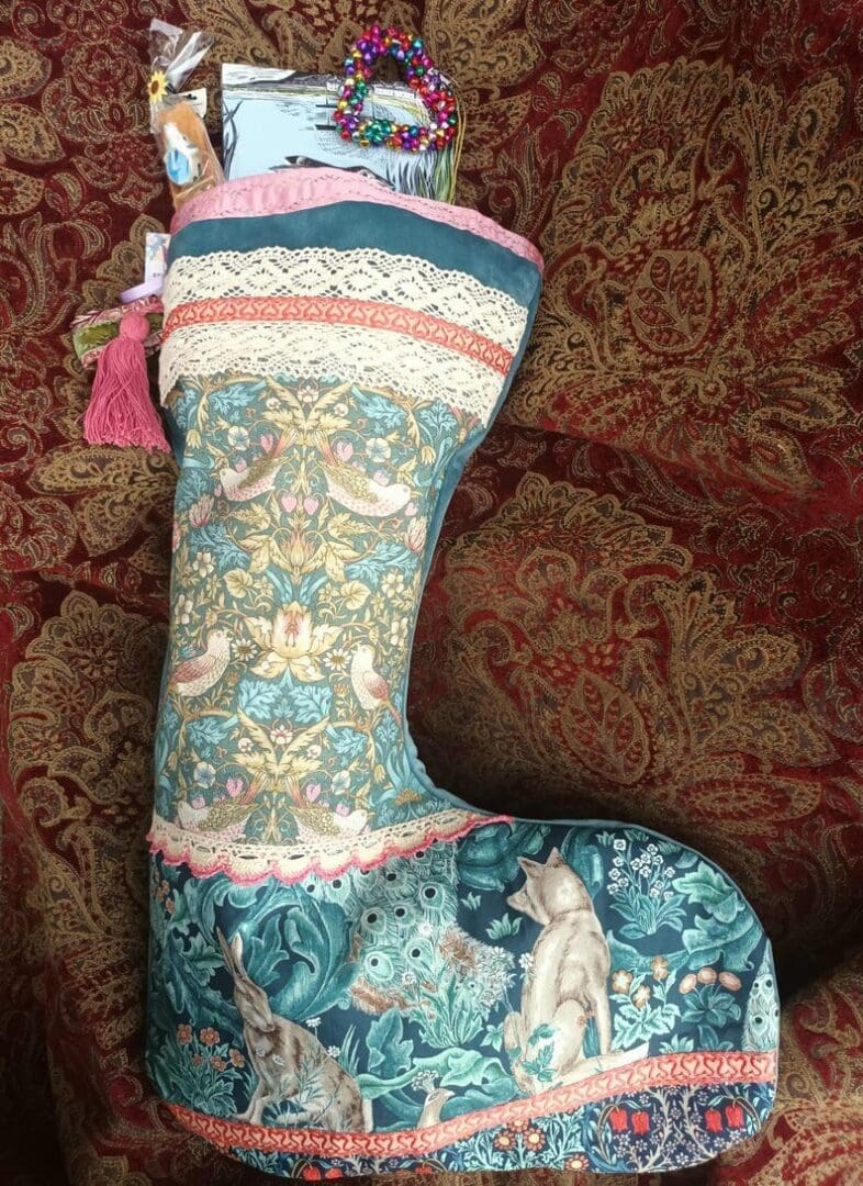 A timeless traditional Christmas Stocking handmade from William Morris fabric.