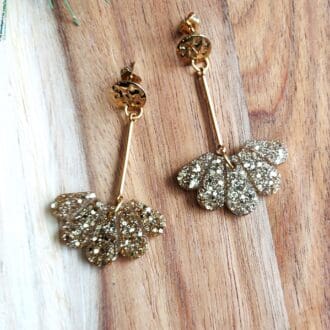 art deco inspired fan drop earrings made in gold glitter.