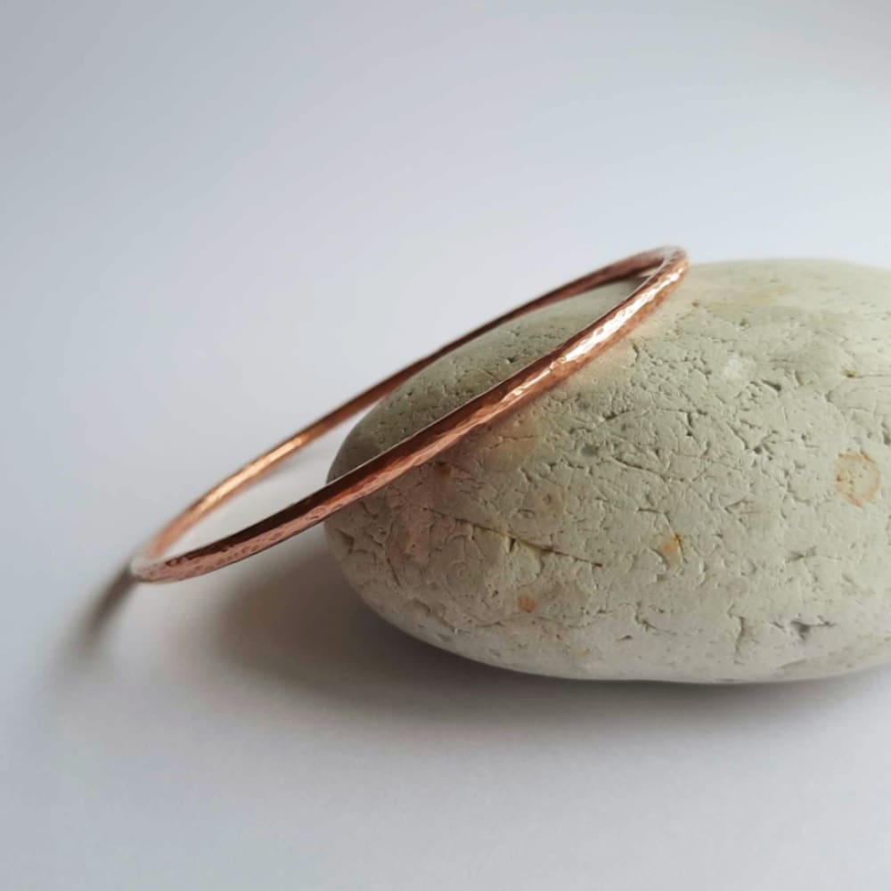 Boho style hammered copper stacking bangle, artisan made by The Tiny Tree Frog Jewellery