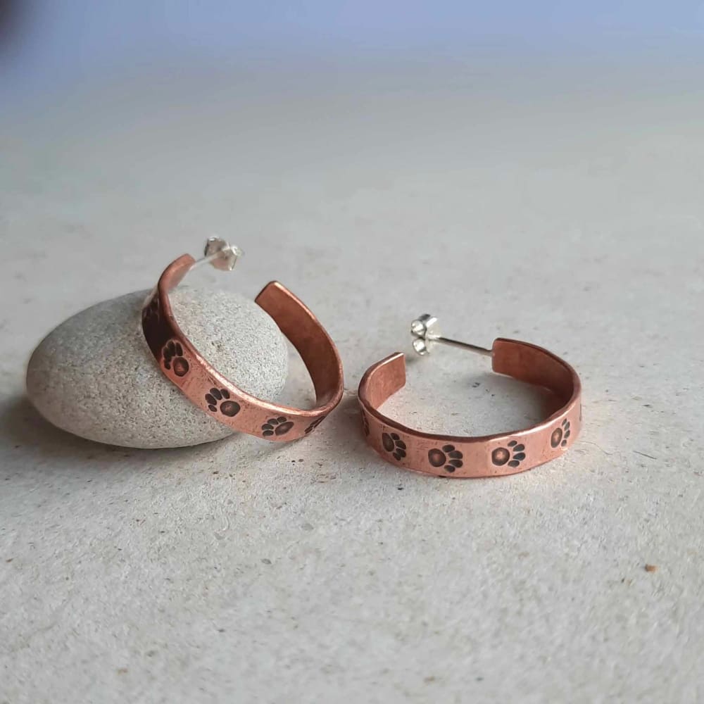 Copper paw print stud hoop earrings, artisan made by The Tiny Tree Frog Jewellery